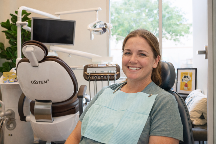 Happy pateint after a walk in emergency visit at Tribute Family dentistry