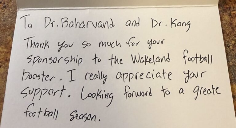 Handwritten thank-you card from the Wakeland Football Boosters to Dr. Baharvand and Dr. Kang